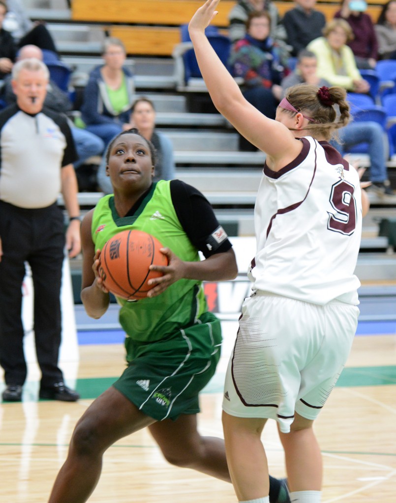 Jennika Bannerman drives to the basket vs. MacEwan on Saturday.